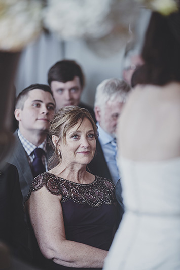 groom's mother during rings exchange