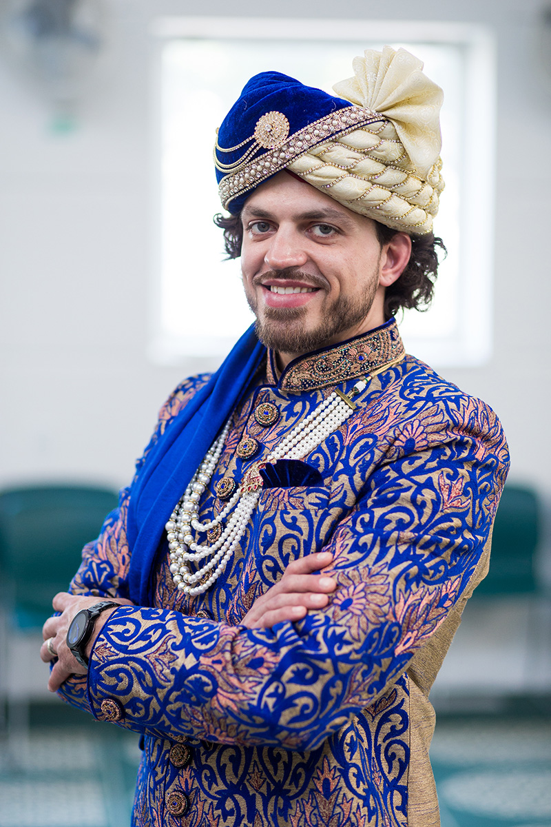 groom in traditional muslim outfit