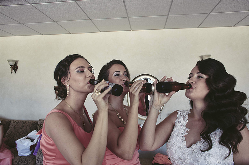 bridesmaids drinking beer