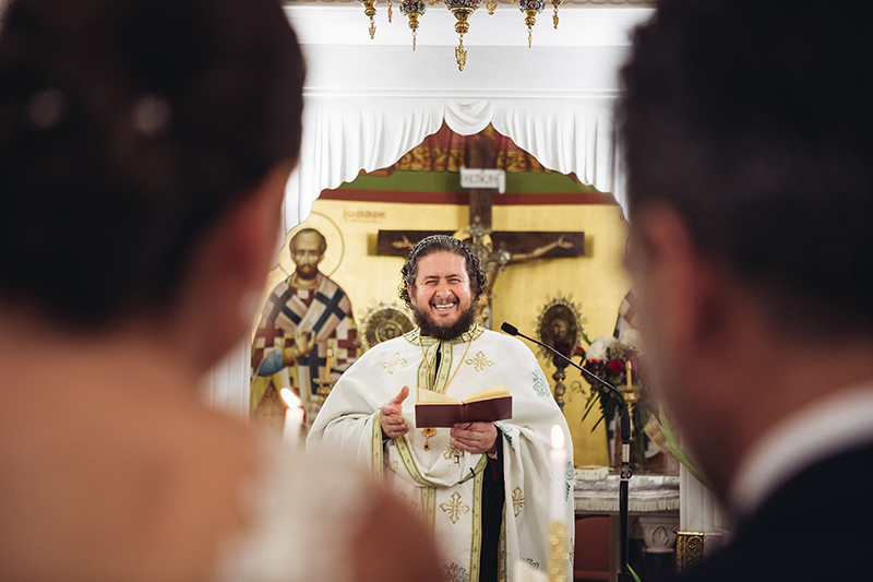 priest smiling