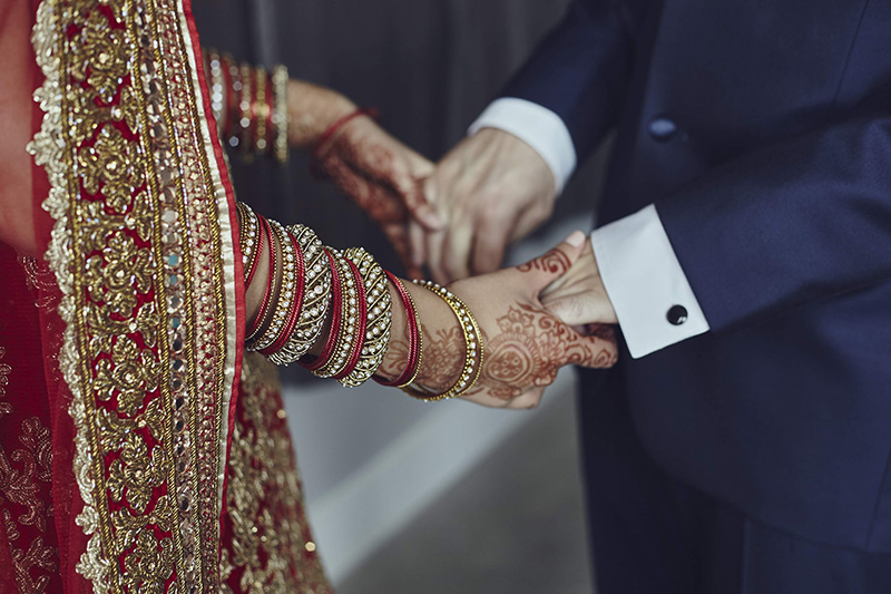 indian couple holding hands