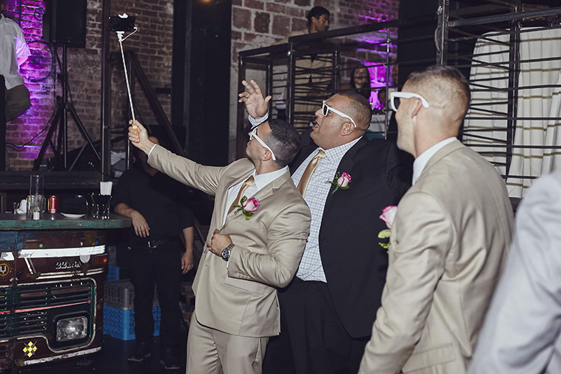 groomsmen taking selfie