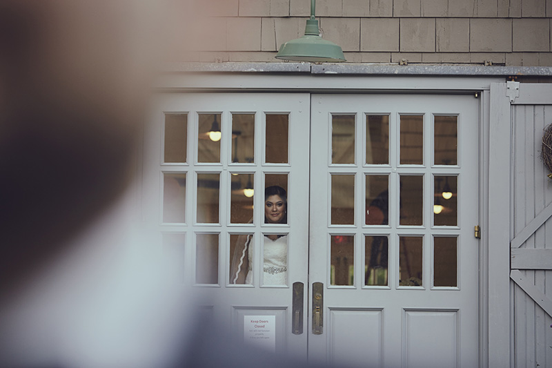 bride looking through door