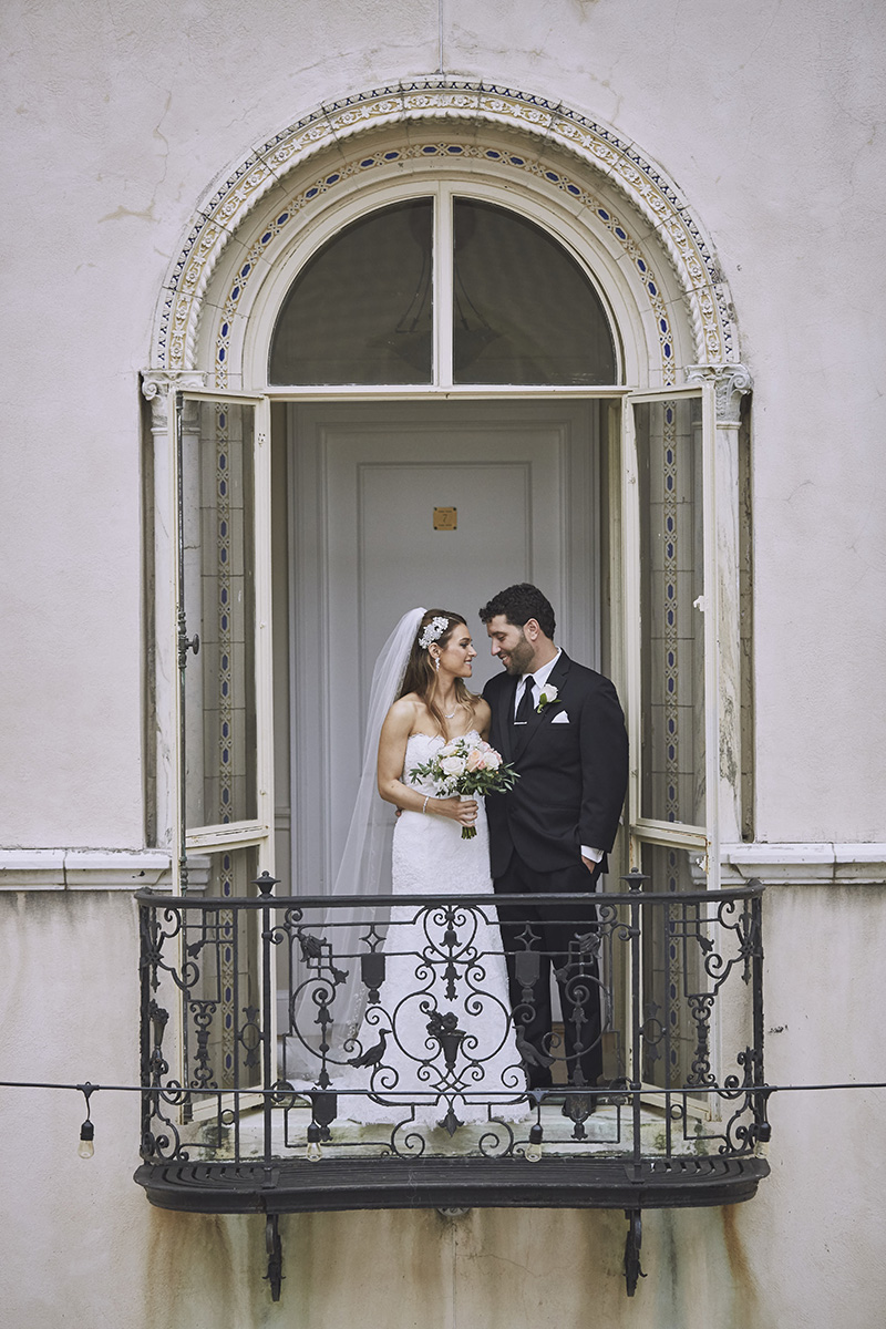 bride and groom on the balcony 