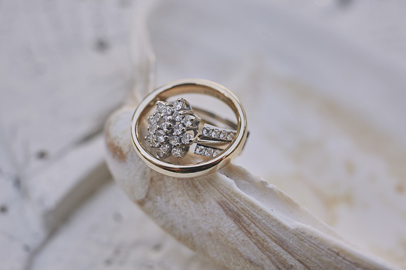 wedding rings on a shell