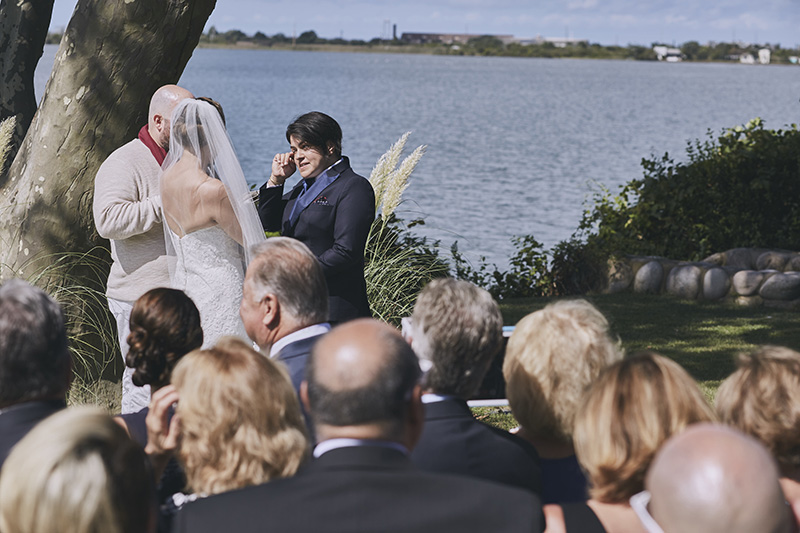 bride crying at wedding ceremony