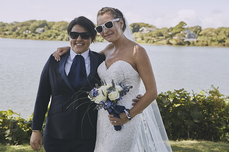 same sex brides with sunglasses