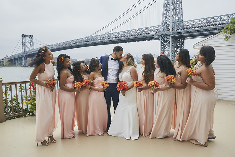 bridesmaids with couple