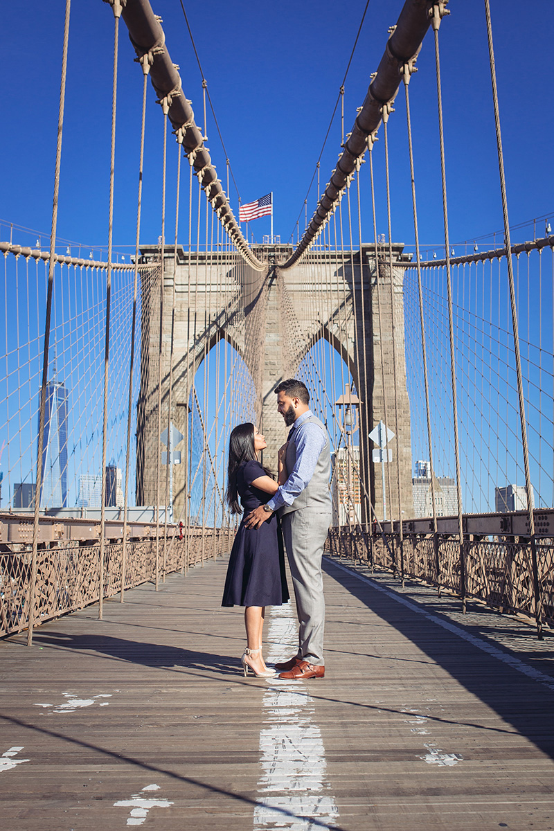 Young couple on the Brooklyn bridge