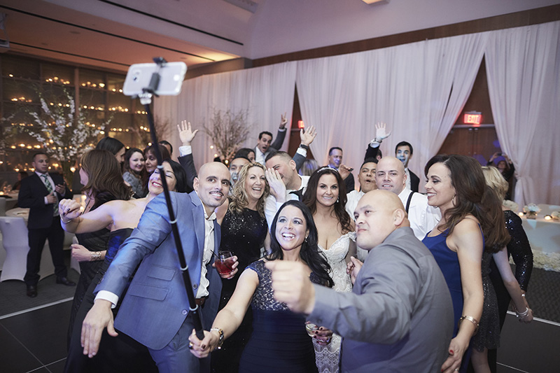 guests taking selfie 