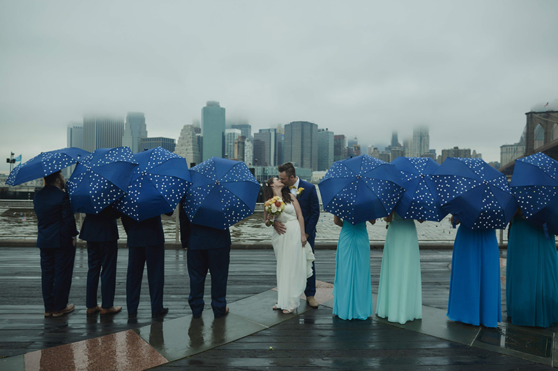 bride and groom portraits with umbrellas