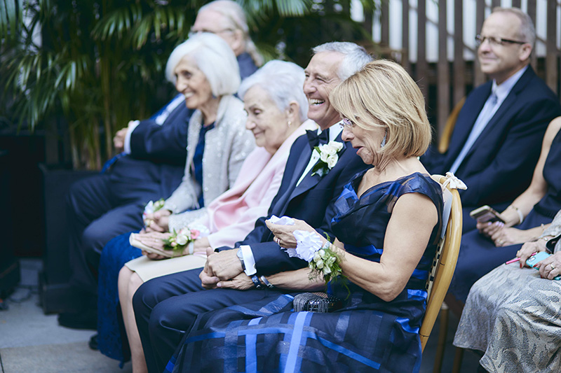 parents of the bride laughing