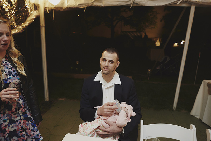 feeding the baby at a wedding