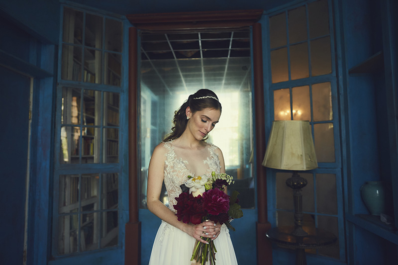bride looking at flowers