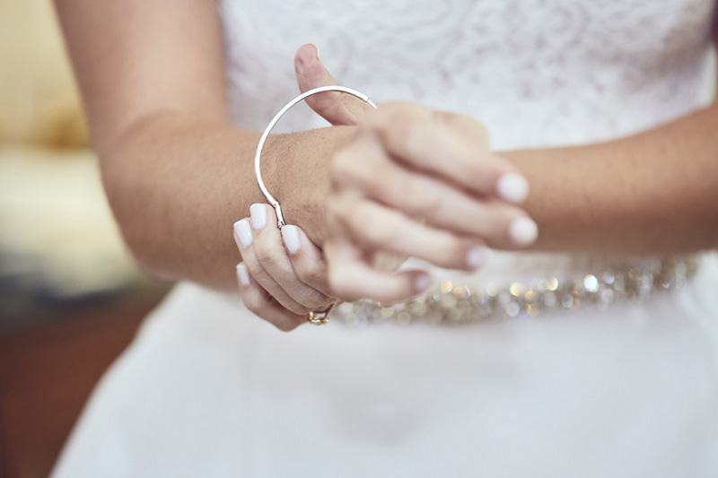 bride's put on the bracelet