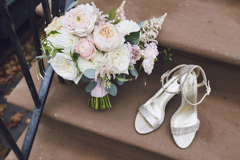 bridal bouquet and bride's wedding shoes