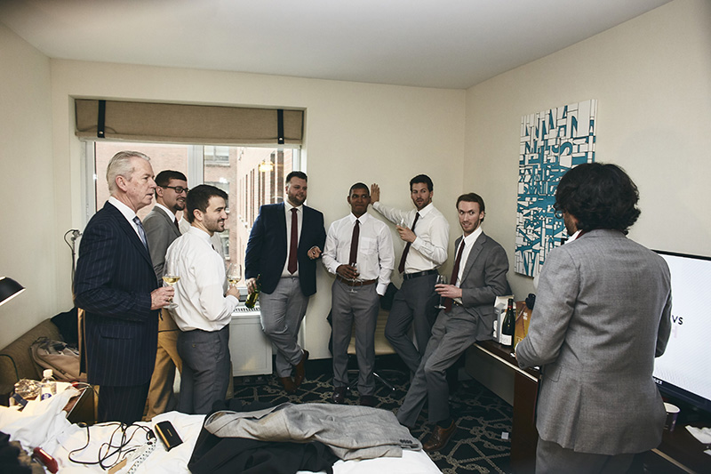 groom with groomsmen getting ready for the wedding 