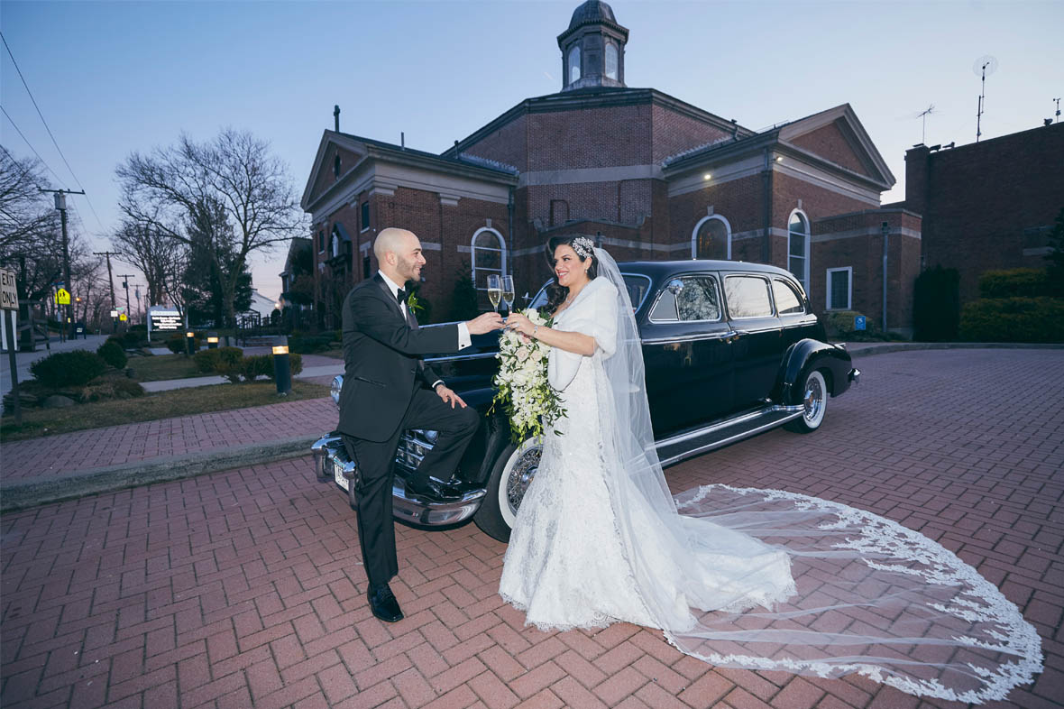 Wedding portraits with old timer limo