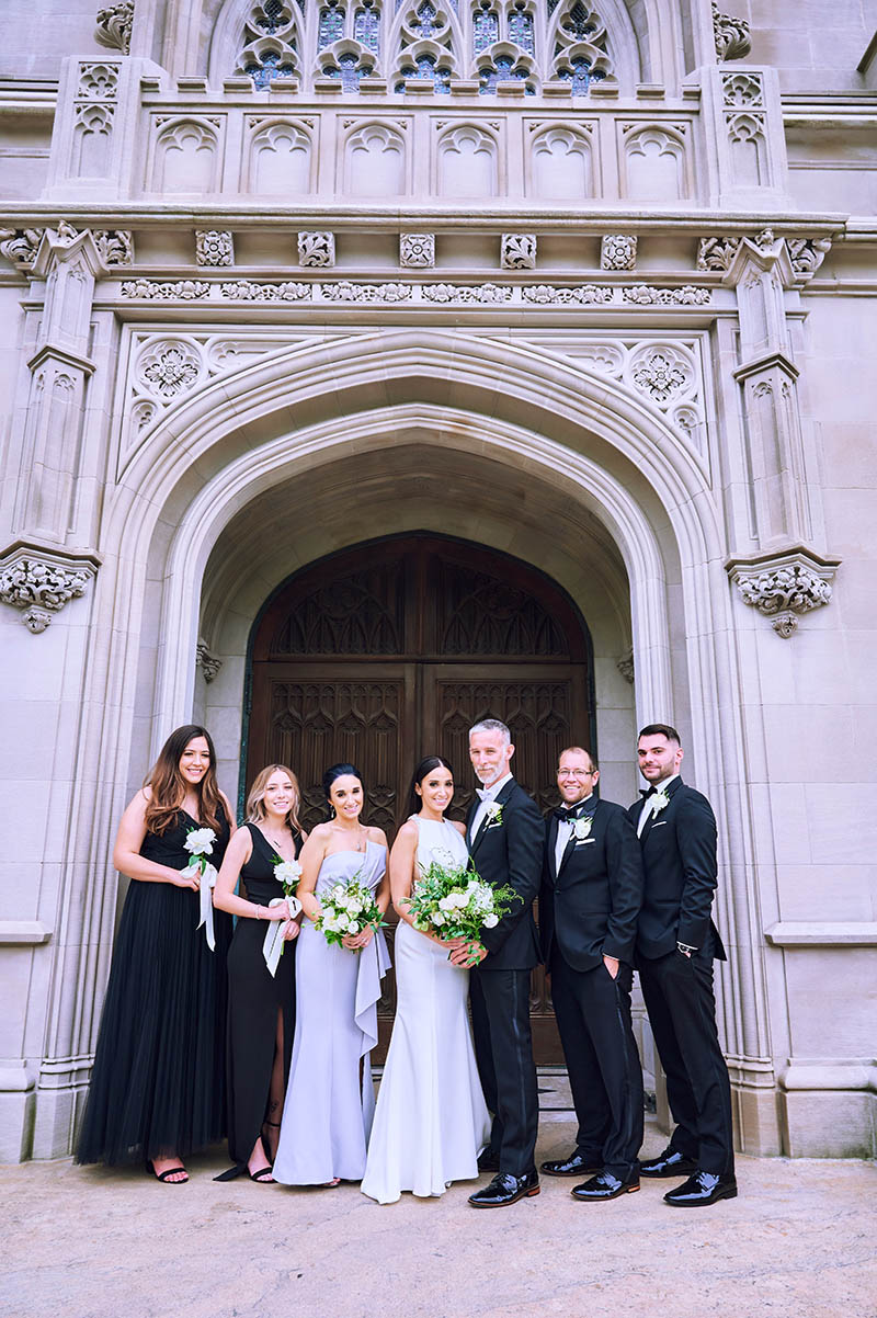 Bridal party portrait in front of the chapel