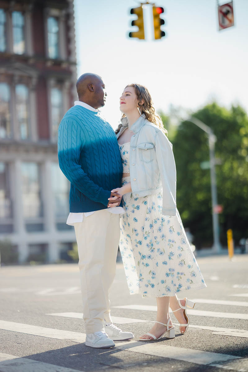 Couple standing on crosswalk