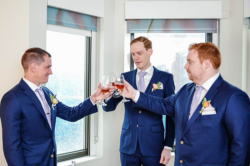 Groom toasting with groomsmen