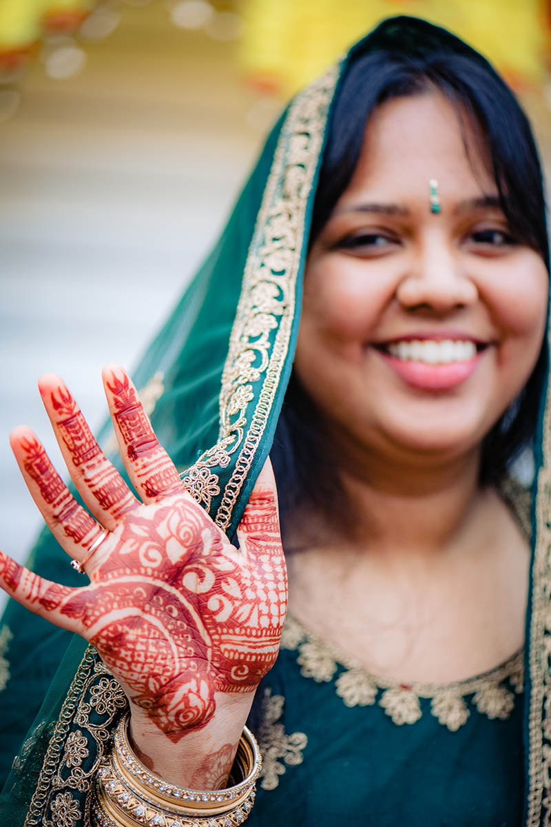 Indian bride showing her hanna art