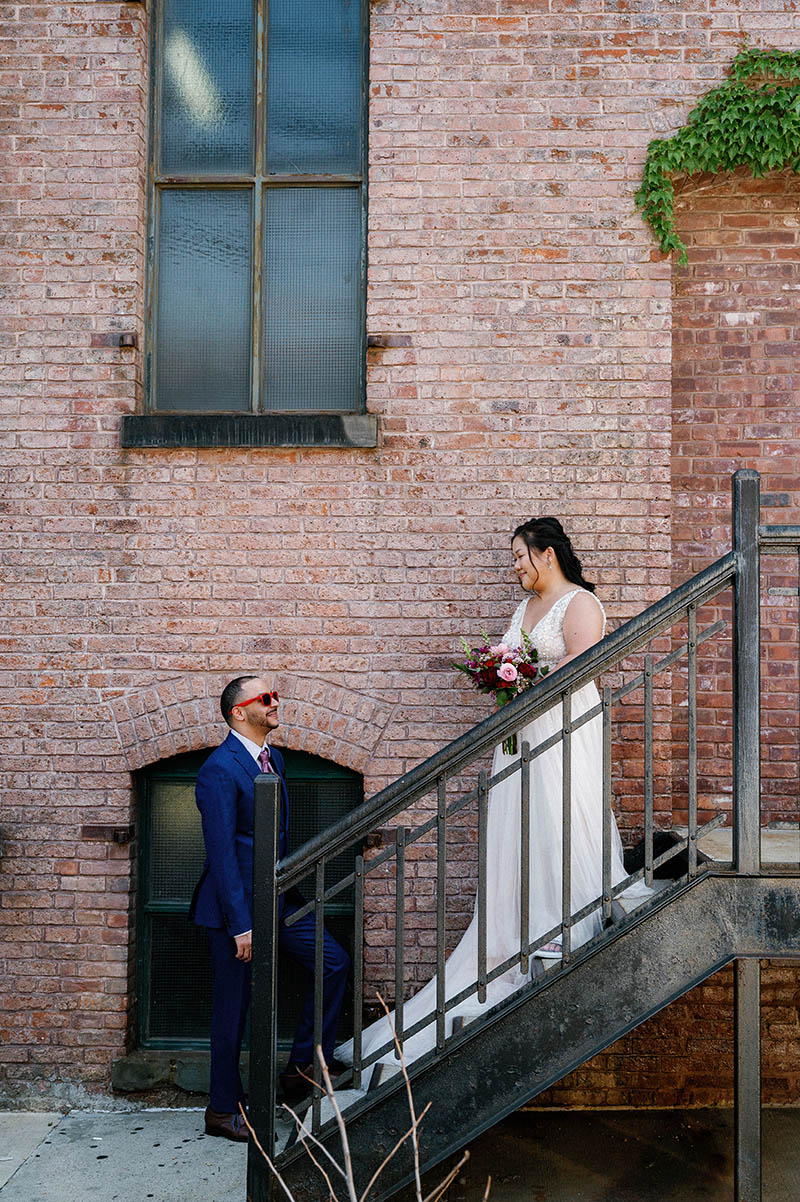 Bride and groom portrait on staircase
