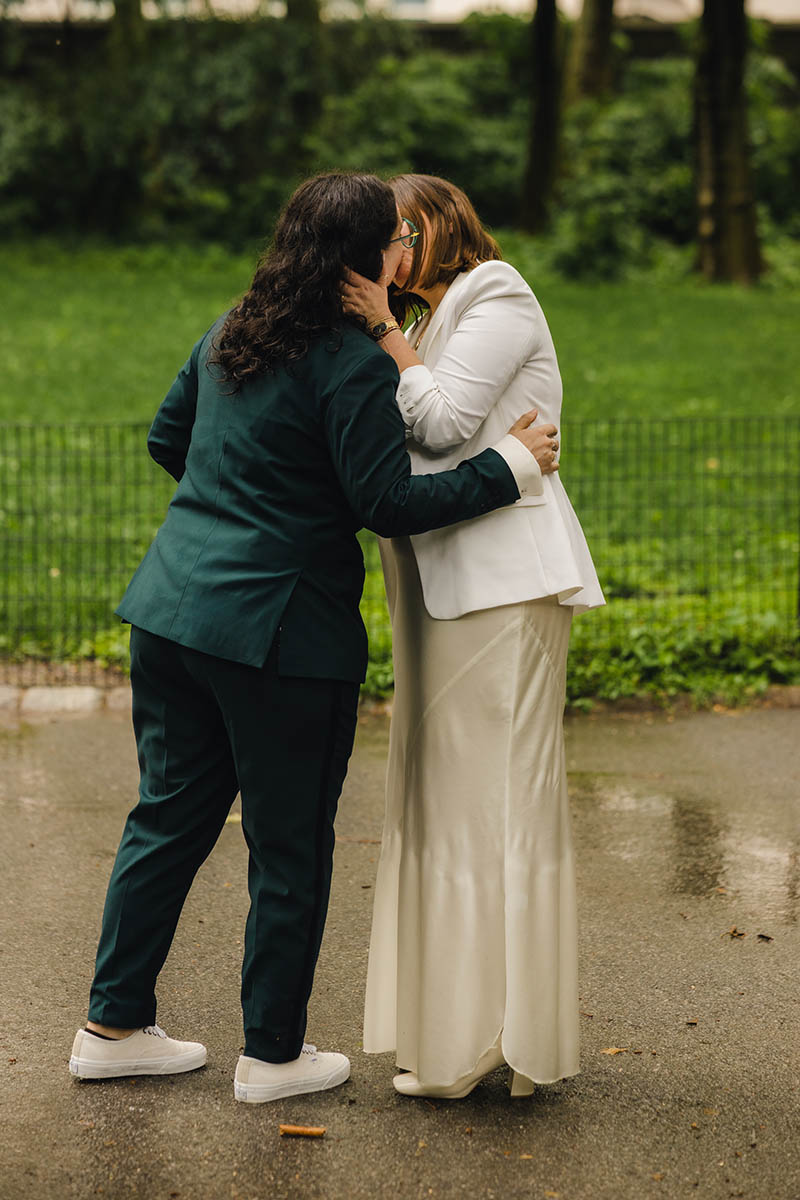 Same sex wedding ceremony first kiss