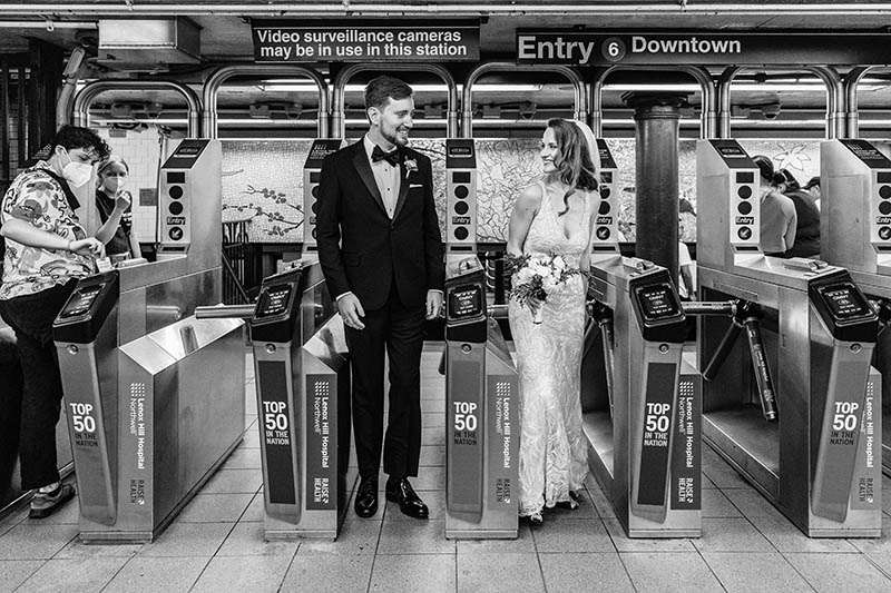 Bride and groom in subway