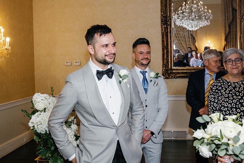 Grooms reaction to seeing bride walk down the aisle
