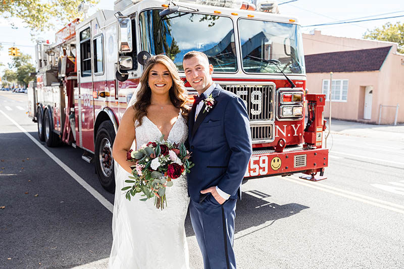 Bride and groom with fire truck