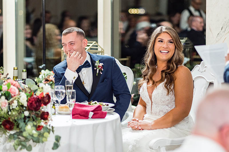 Bride and groom reaction to toast
