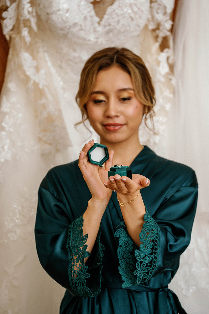 Maid of honor holding wedding rings