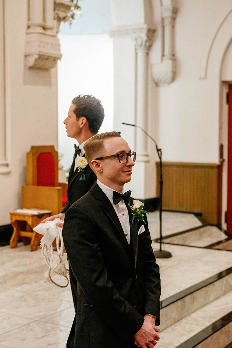 Grooms reaction to seeing bride walk down the aisle