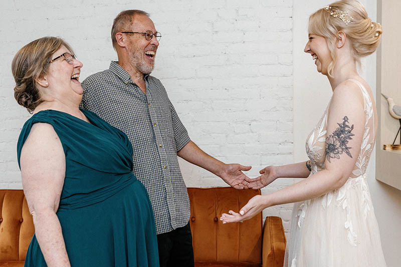 Parents reaction to seeing bride in wedding dress
